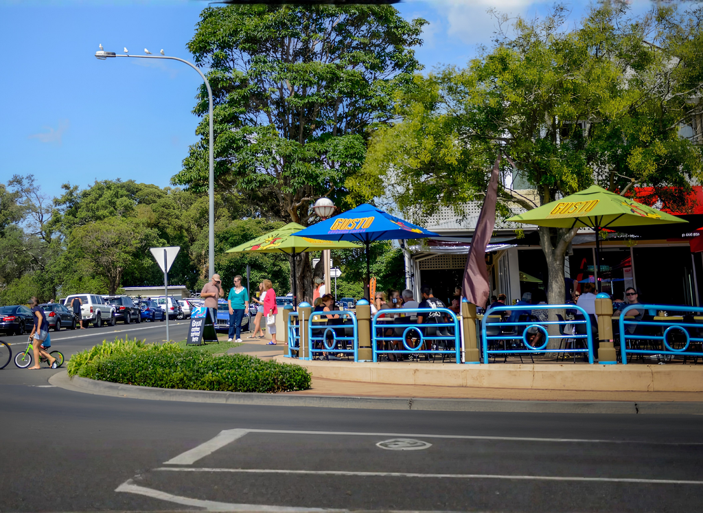 Angels Bayside café with outdoor seating and umbrellas in Gosford