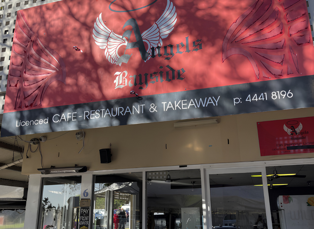 Exterior sign for Angels Bayside licensed café and restaurant