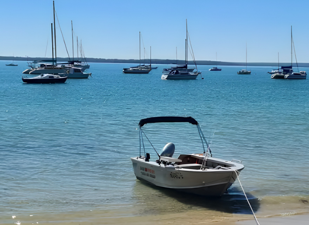 Boats anchored in the blue waters of Jervis Bay