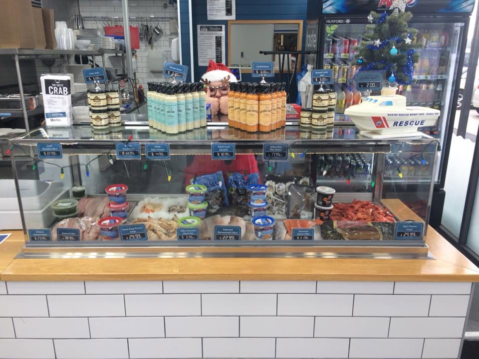 Seafood counter with fresh fish, prawns and takeaway products at The Salty Crab Vincentia